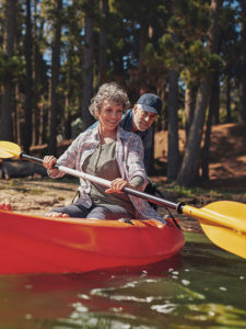 Man and woman in canoe in Bend or